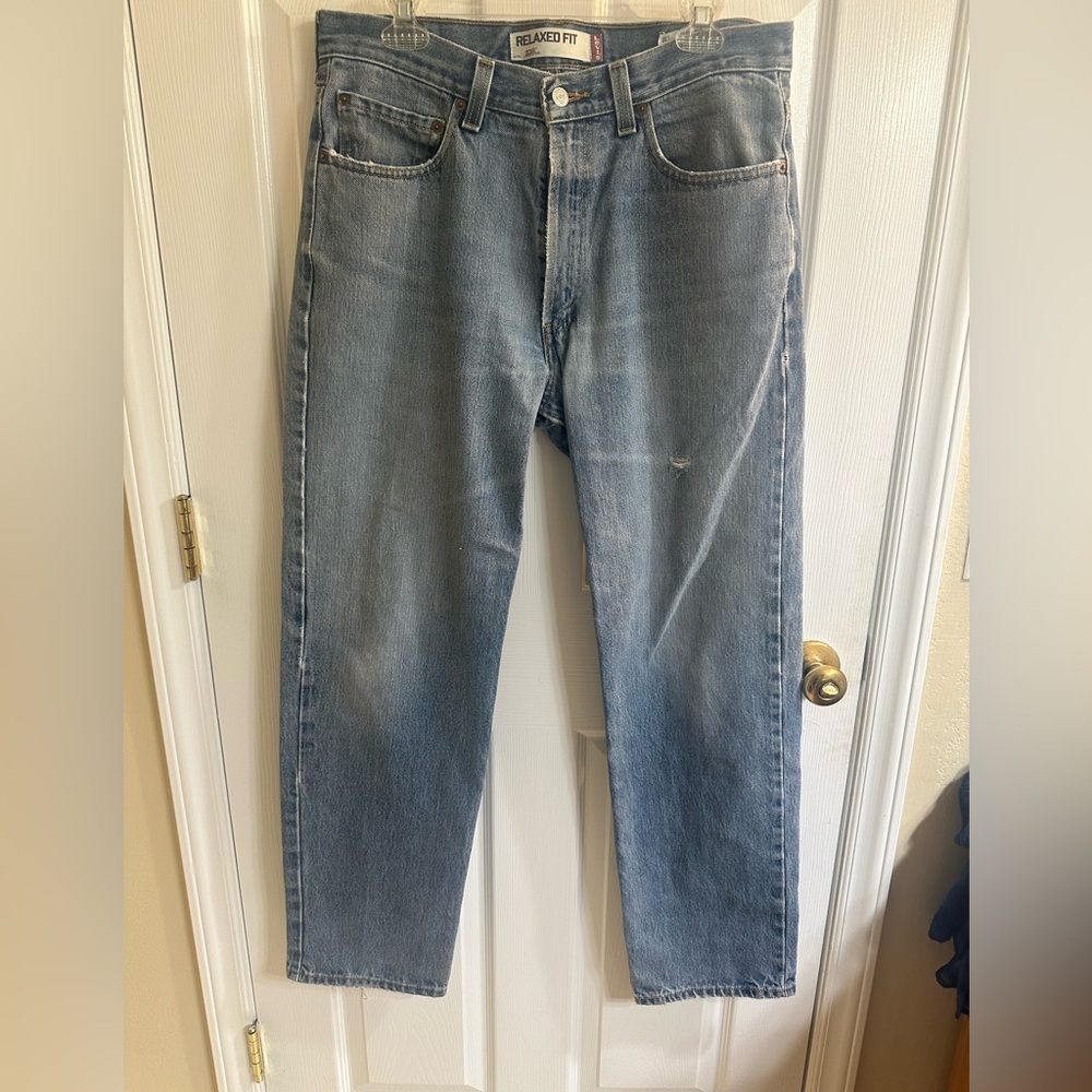Vintage Mens Distress Levi’s 550 light blue denim 34x32 Relaxed Fit